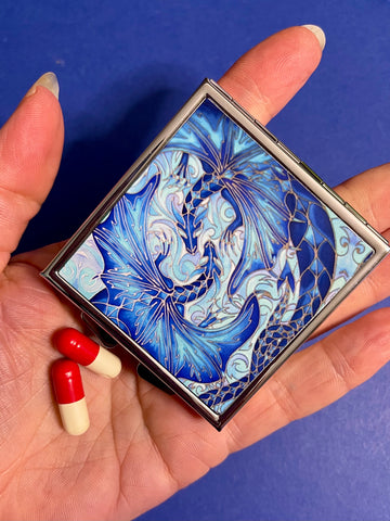 Blue dragon square pill box for, pocket, handbag, purse or desk drawer. Opens to reveal four sections for dividing pills. Also make a great jewellery box for small stud earings and hoops.