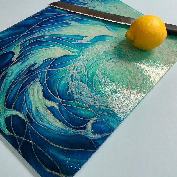Blue Dolphin glass chopping board, platter, counter saver, trivet made of toughened glass - measures 28x38cm in blue and aqua -gift for dolphin lovers and lovers of the sea and ocean.