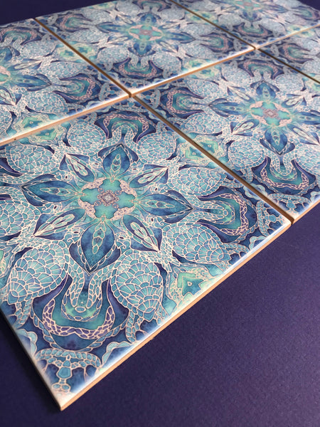 Blue turtle mandala tiles 6x6” squares with a smooth shiny surface, gorgeous aqua ultramarine & royal blue shades, hand printed by Meikie in her Studio. Perfect for a bathroom makeover as a full wall, border or individual tiles set into plain tiles.