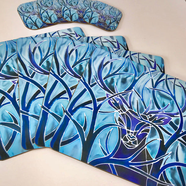 Blue Stag square table mats and matching coasters - hard wearing durable mats - 28x28cm  placemats in blue and aqua -gift for woodland, forest, tree and wildlife lovers. 
Square Stag place Mat - Stag Table Mats and Coasters